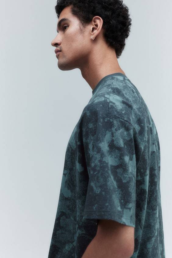 HM Sportshirt aus DryMove™ in Loose Fit Exklusivangebot