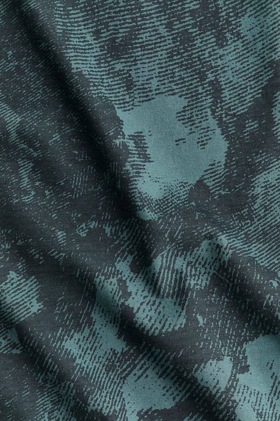 HM Sportshirt aus DryMove™ in Loose Fit Exklusivangebot