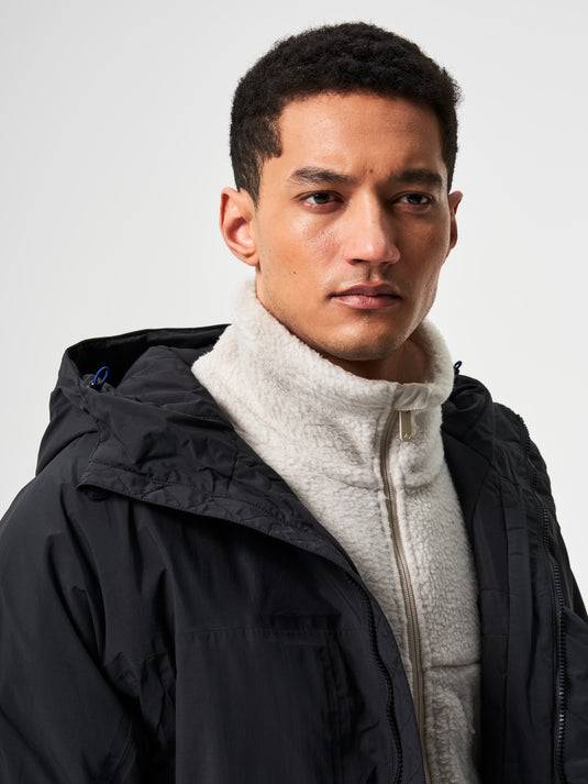 Pinqponq Parka - Peat Black (Unisex) Kostenlose Rückgabe
