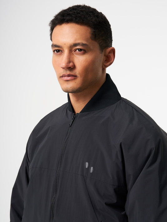 Pinqponq Light Bomber Jacket - Peat Black (Unisex) Zeitbegrenzte Promotion